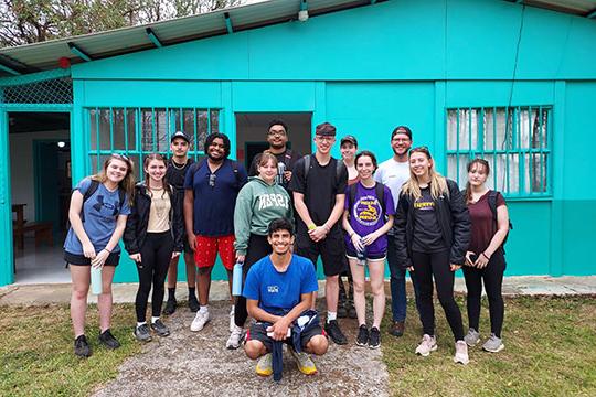 group of students in front of building