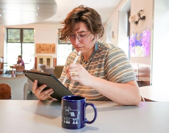 student working on a tablet