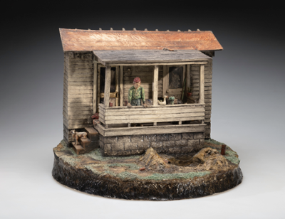 Image caption: Jack Earl (1934-2023), It's About Time, 1983, ceramic, painted, 16 3/4 x 21 x 17 1/2 inches, Gift of Crown Equipment Corporation, ACAM 2023.21, photo by Brian Oglesbee   Ceramic sculpture of an old farm house featuring a male character on the porch looking at where his yard has been dug up to fix a broken pipe. The porch is a bit cluttered with miscellaneous items and a dog is sitting on the steps.